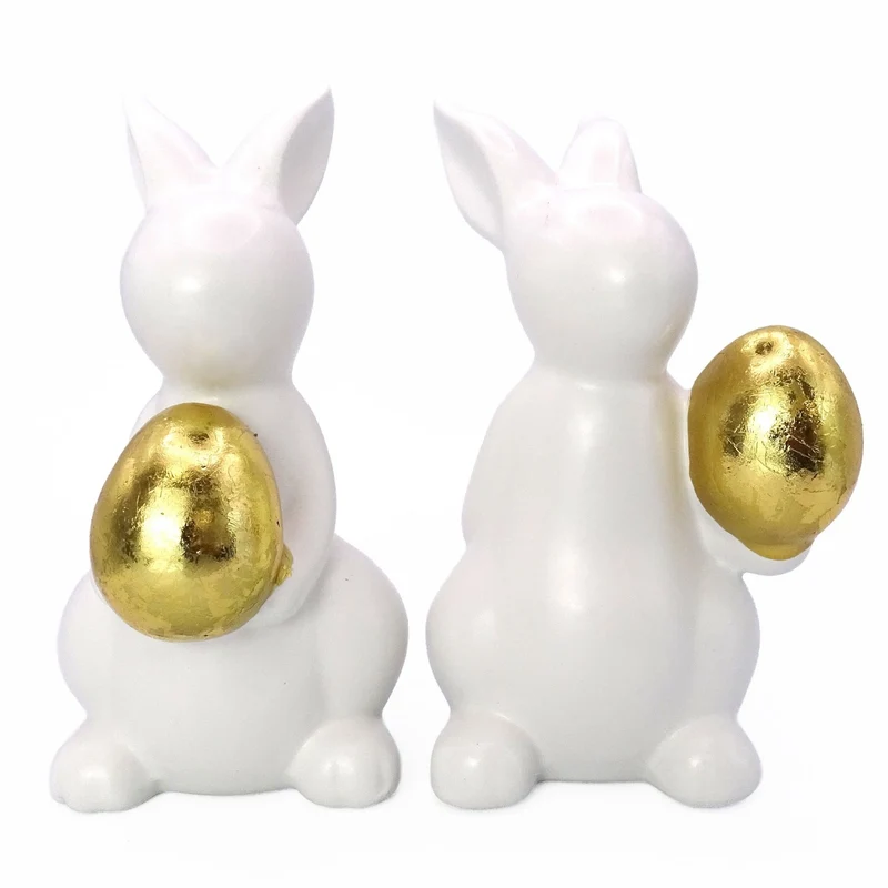 Logbuch-Verlag Keramik Hase mit Ei weiß 2er Set – Osterhasen 14 cm mit goldfarbenem Ei – Elegante Osterdeko – Figuren zum Hinstellen