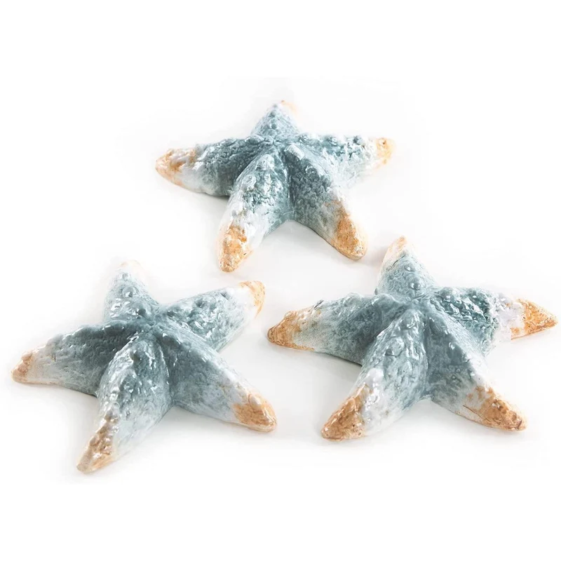 3 Seesterne aus Keramik beige blau - Maritime Deko