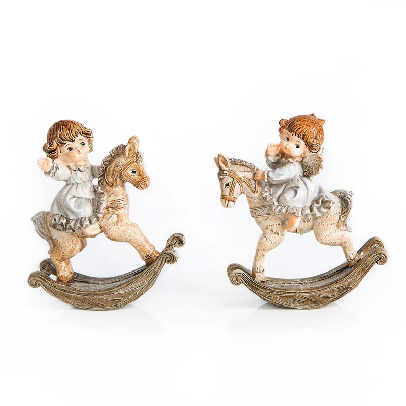 2 Engel Figuren auf Schaukelpferd 10 x 9 cm