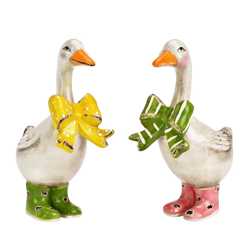 Logbuch-Verlag Keramik-Gänse 2er-Set mit Schleife 11 cm – Dekofiguren in Gelb & Grün für Frühling, Ostern oder Fensterbank