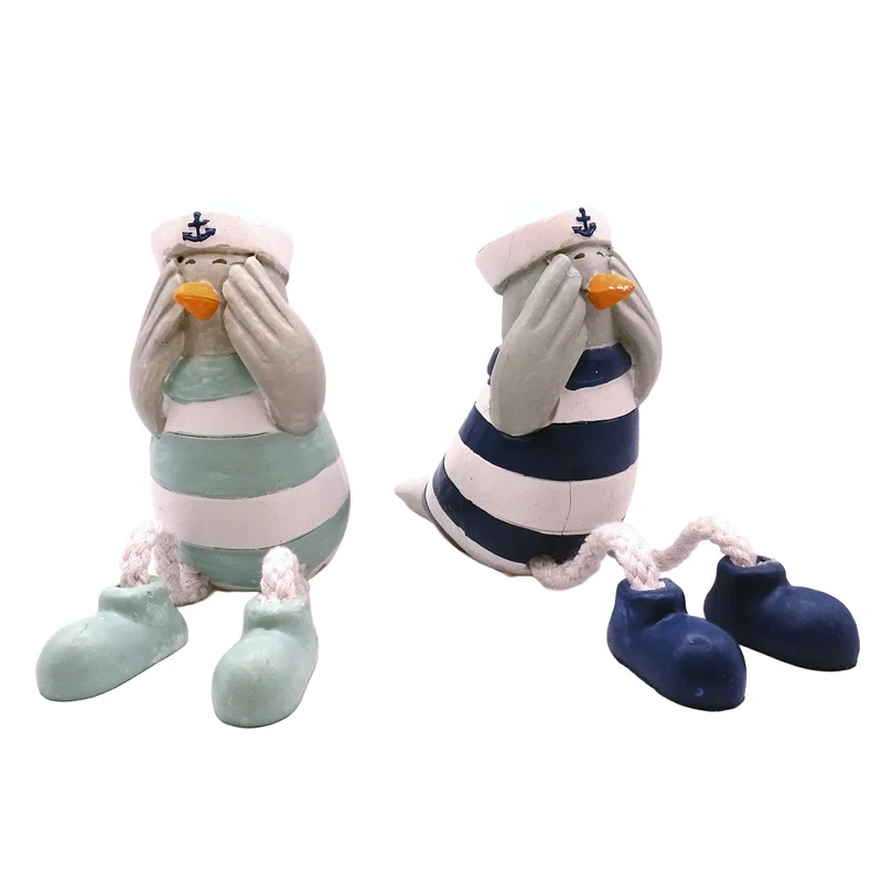 Logbuch-Verlag Deko-Möwen 2er-Set 18x8x4,5 cm – Maritime Figuren aus Polyresin mit baumelnden Beinen – Seemöwen blau-weiß für Fensterbank