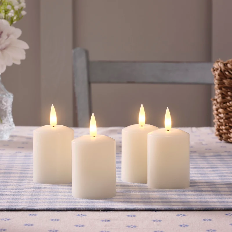 4er Set TruGlow® LED Votivkerzen Echtwachs elfenbeinfarben wiederaufladbar mit Fernbedienung